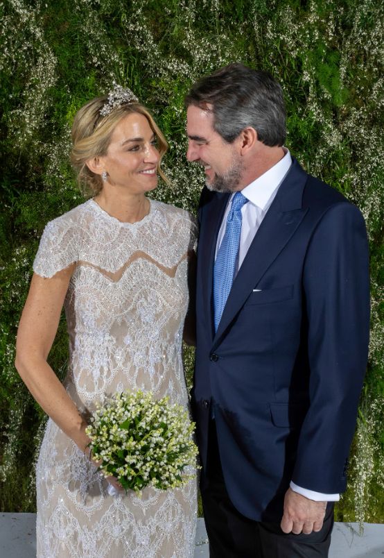 Chrysi Vardinogianni and Prince Nikolaos staring at each other on their wedding day