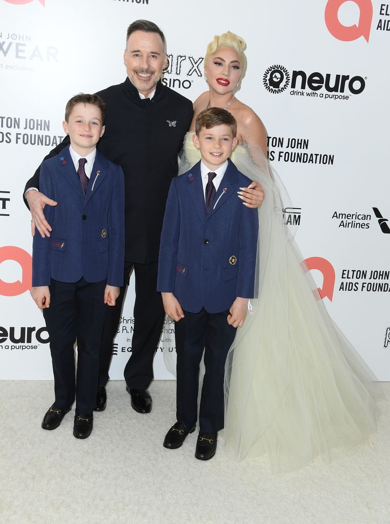 David Furnish and his sons with Lady Gaga 