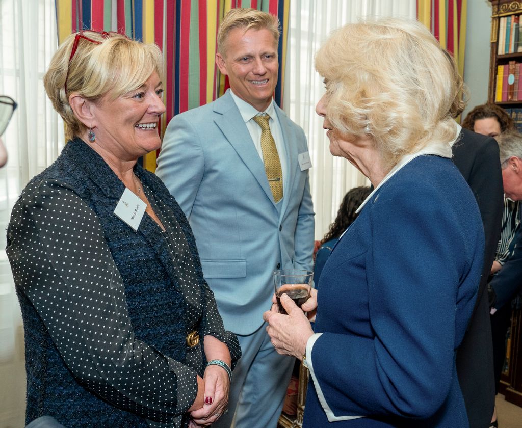 Queen Camilla talking to Jo Malone at MDD reception