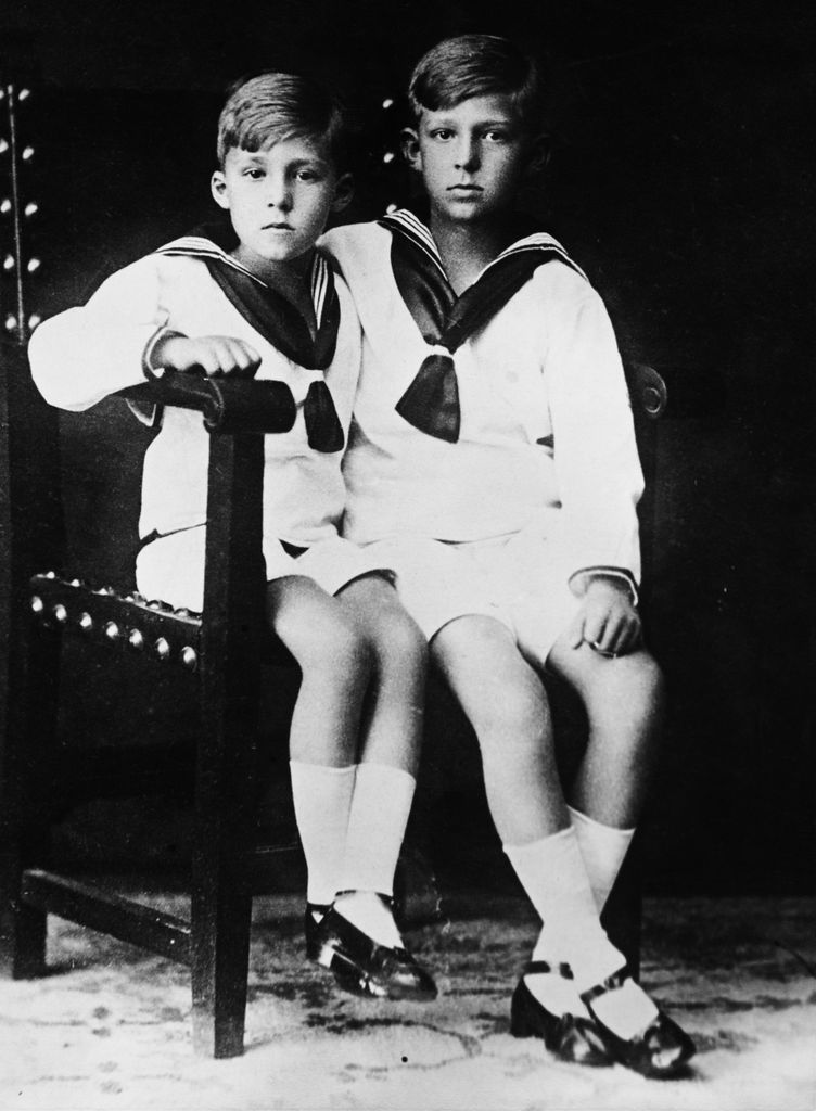 Infante Alfonso (left) and Juan Carlos as children in sailor suits