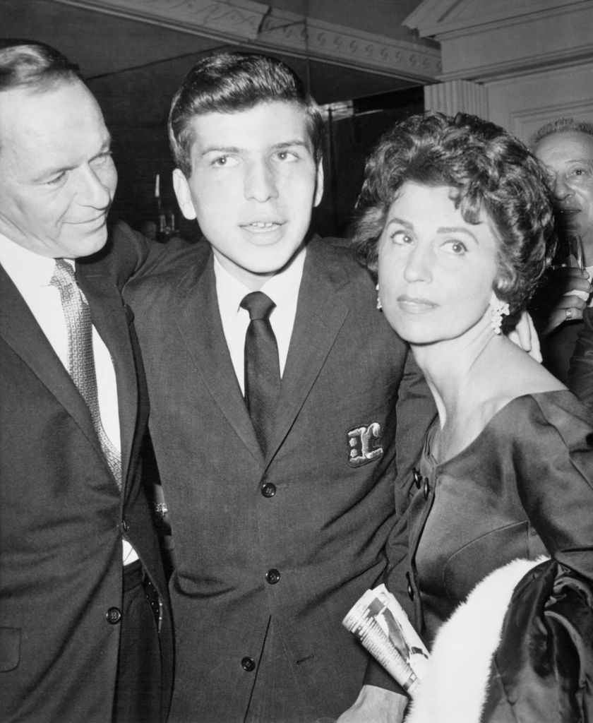 Frank Sinatra Sr., Singer-Actor, with his ex-wife Nancy embraces his son Frank Jr. after he made his Los Angeles singing debut at the Cocoanut Grove, California, March 1967.