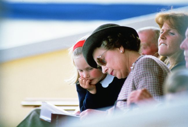 Zara Tindall in childhood with Queen Elizabeth II