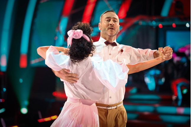 Will Mellor in a dance hold 
