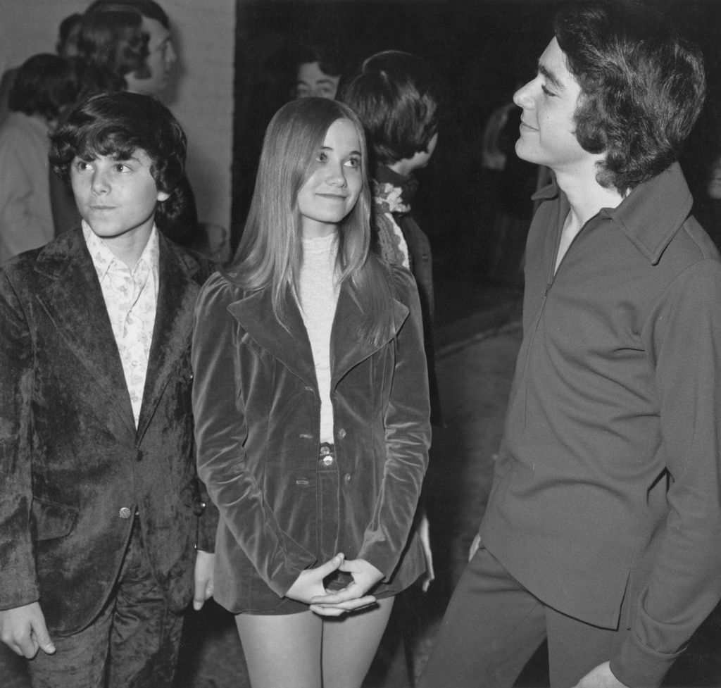Christopher Knight, Maureen McCormick and Barry Williams, stars of the US TV sitcom 'The Brady Bunch', at the premiere of The Who's rock opera 'Tommy', circa 1972