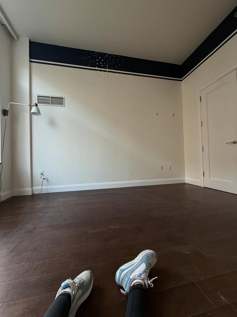 Dylan Dreyer lies on the floor of her empty former kids' room inside her New York City condo, shared on Instagram