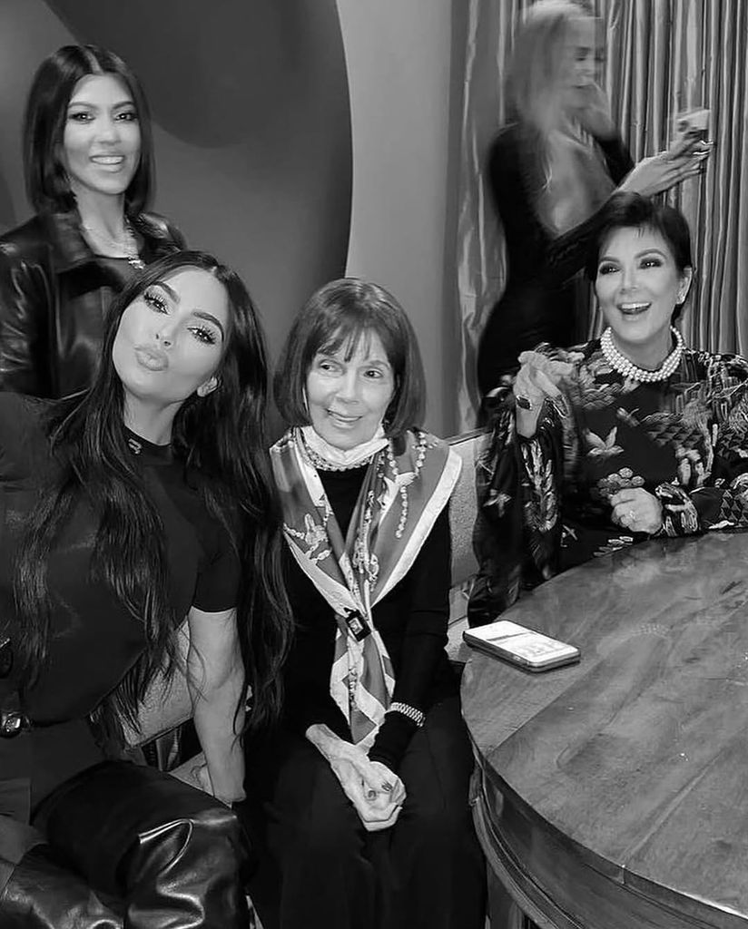 Kris Jenner poses with Kourtney, Kim and Khloe Kardashian, and her om MJ 