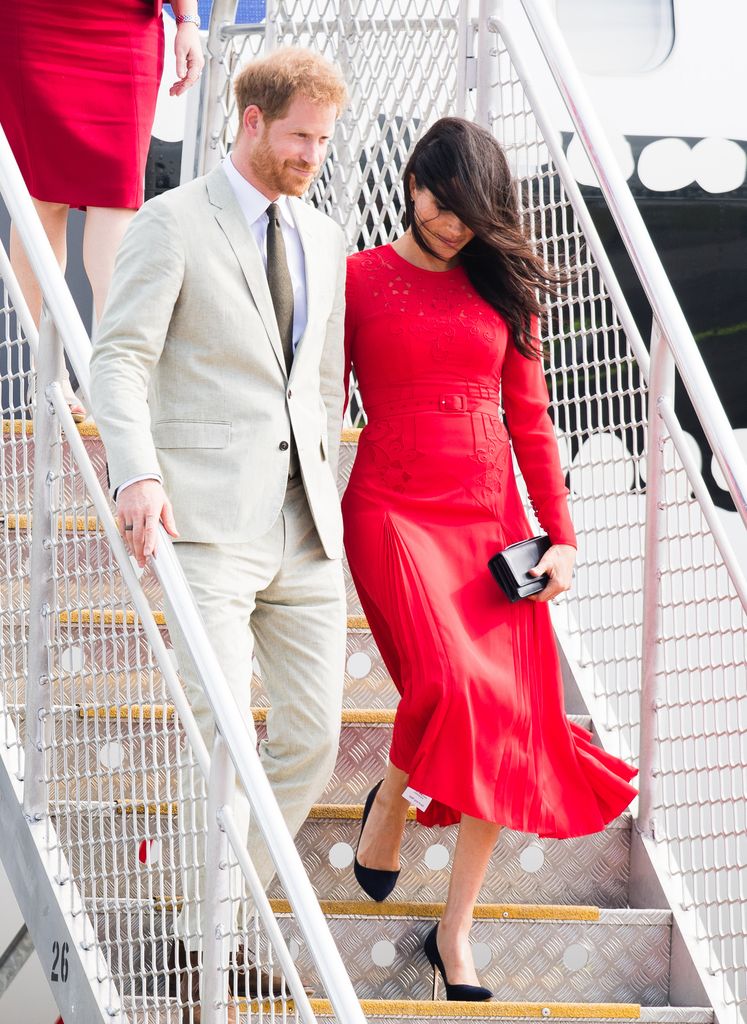 Prince Harry, Duke of Sussex and Meghan, Duchess of Sussex arrive at Nuku'alofa airport on October 25, 2018 in Nuku'alofa, Tonga