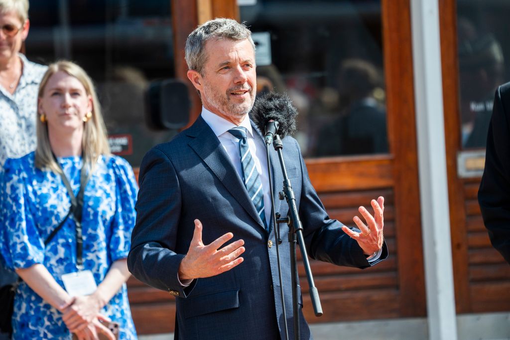 King Frederik X of Denmark speaks at the town square before he and Queen Mary of Denmark walk through the town to their Summer residence at Grasten Castle