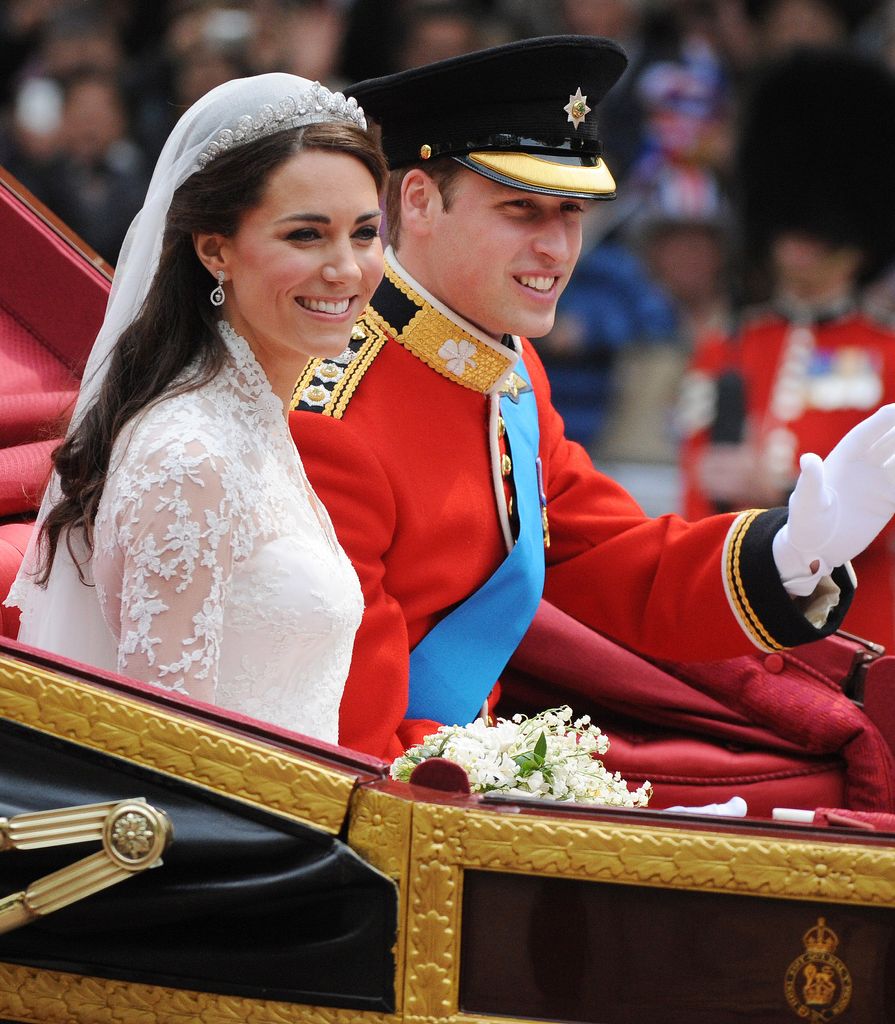Prince William and Kate wave to crowds following their wedding