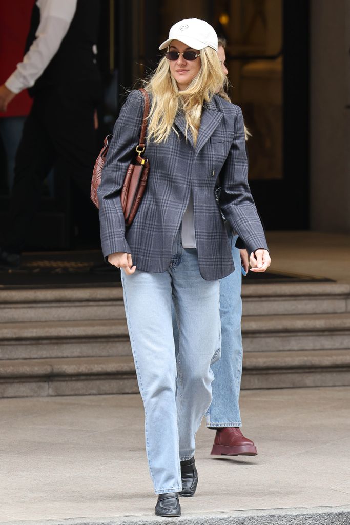 Shailene Woodley in jeans, blazer and cap