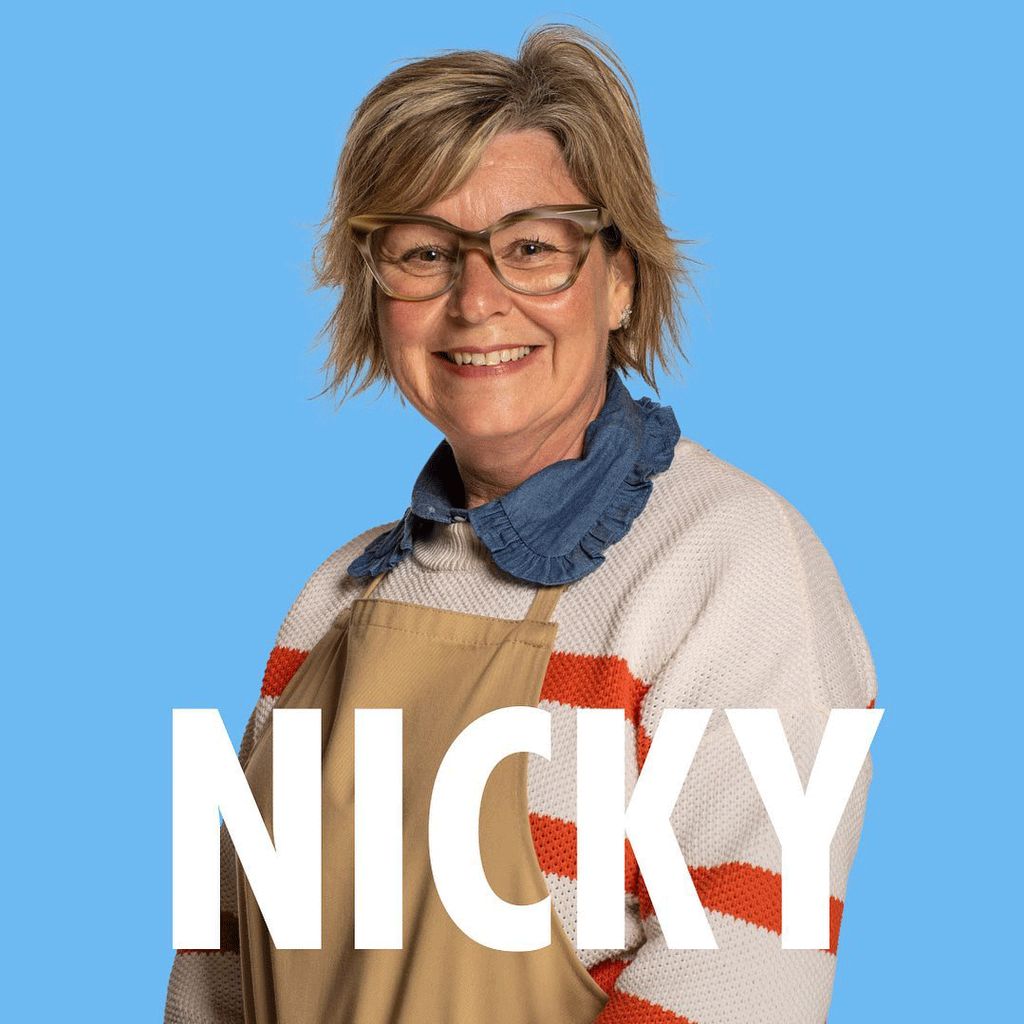 Nicky from Bake Off smiling