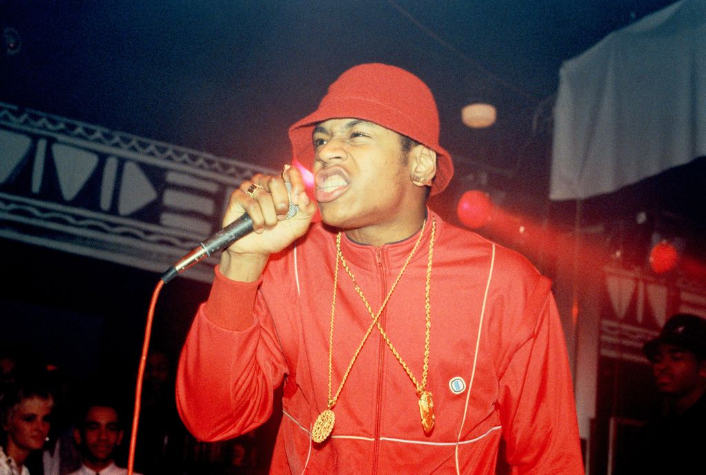LL Cool J rapping in red tracksuit 
