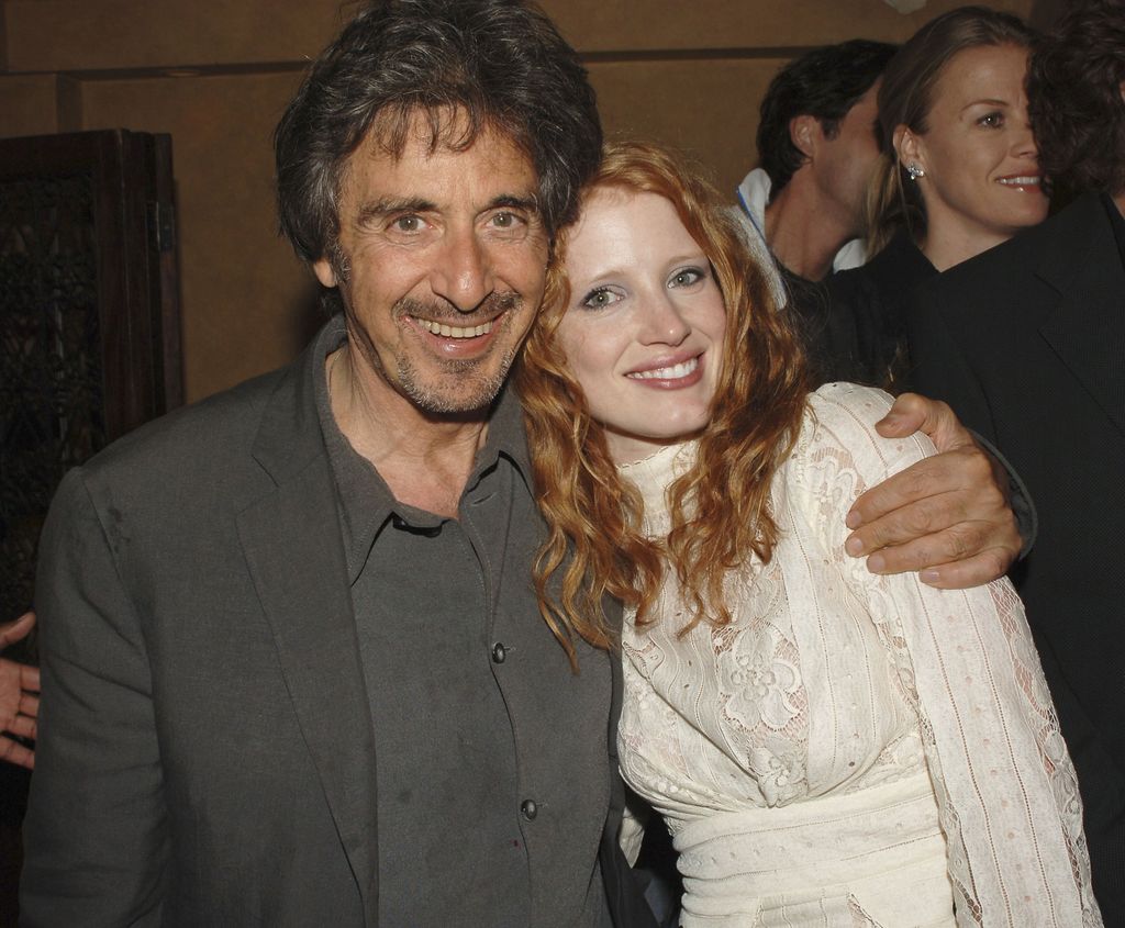 Al Pacino hugging Jessica Chastain