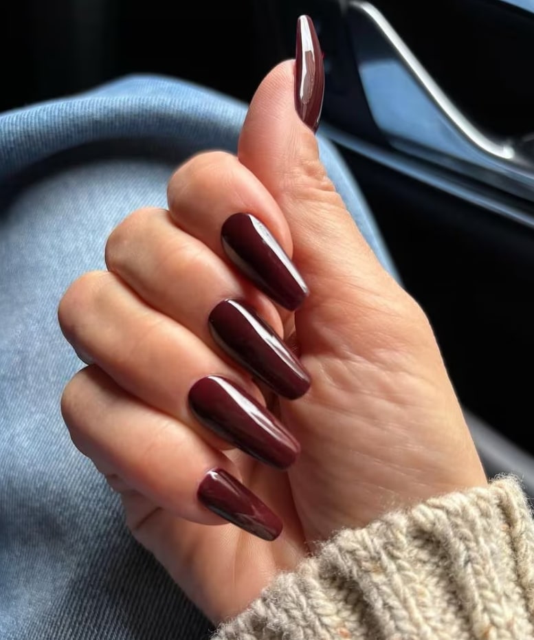 jlo cherry cola nails manicure