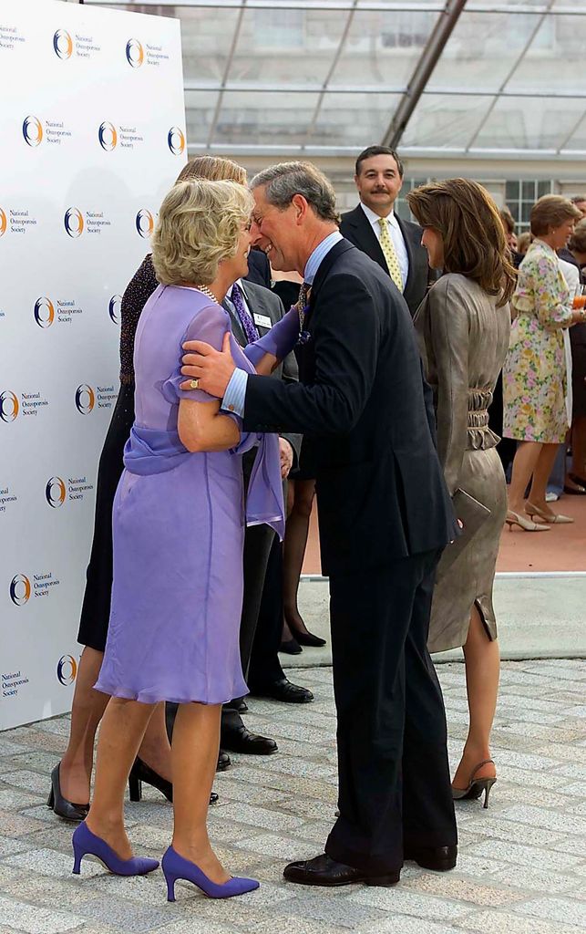 Charles and Camilla embracing at the National Osteoporosis Society anniversary event at Somerset House in 2001
