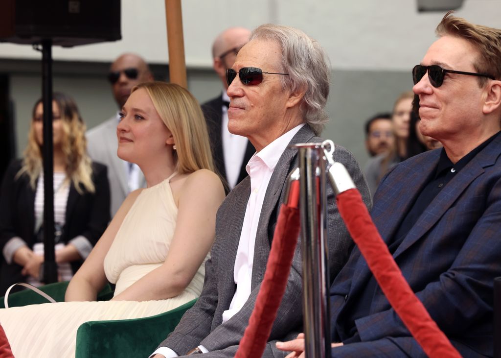 Dakota Fanning, David E. Kelley, and Kevin Huvane are seen as TCM honors actress Michelle Pfeiffer with Hand and Footprint Ceremony at TCL Chinese Theatre on April 25, 2025 