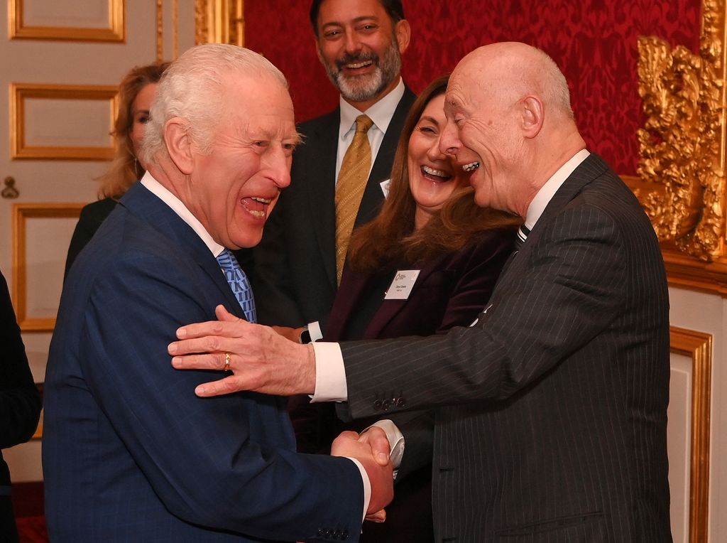 King Charles shaking hands with John Schellnhuber