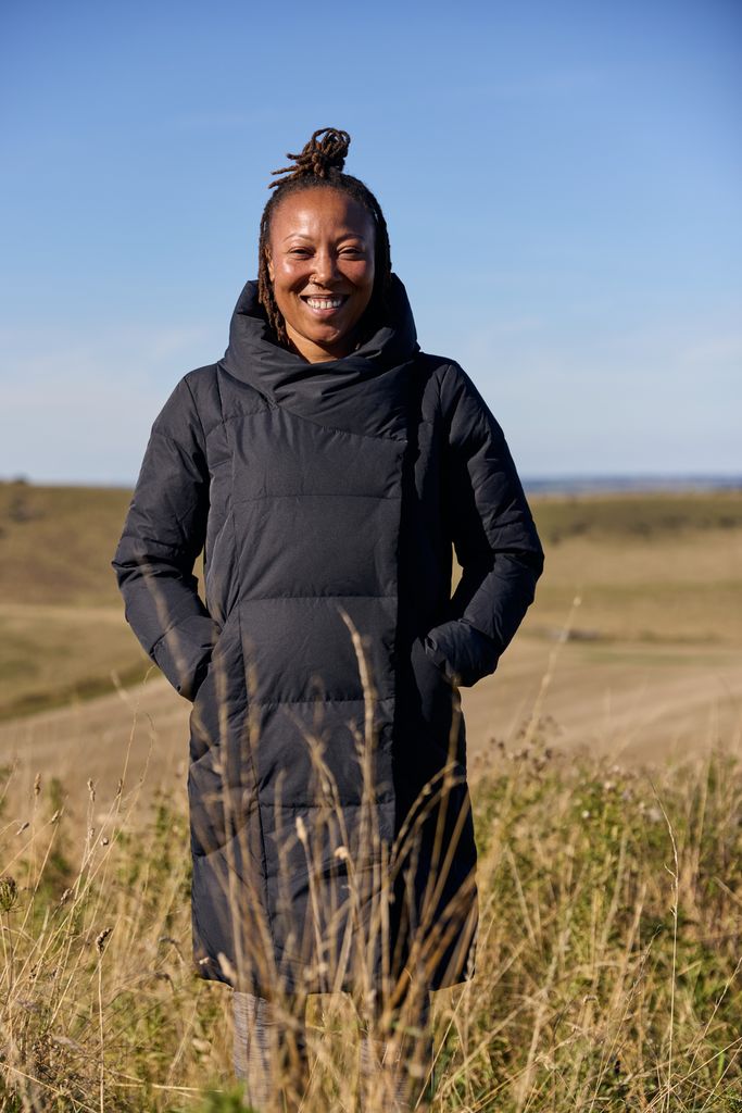 black woman smiling in nature