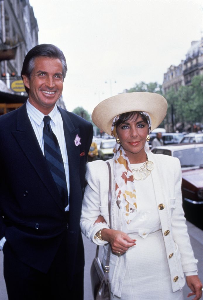 George Hamilton and Elizabeth Taylor in Paris in May 1987