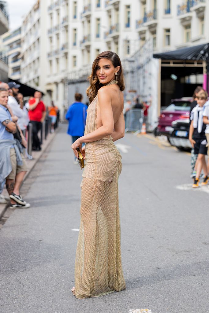 Andrea Del Val brought the glam to the streets of Cannes in a nude embellished backless dress