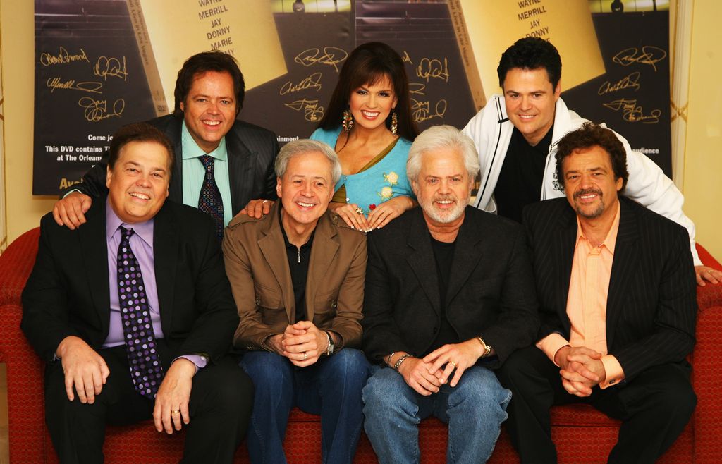 The Osmonds (L-R back row) Jimmy, Marie, Donny, (L-R front row) Alan, Wayne, Merril and Jay