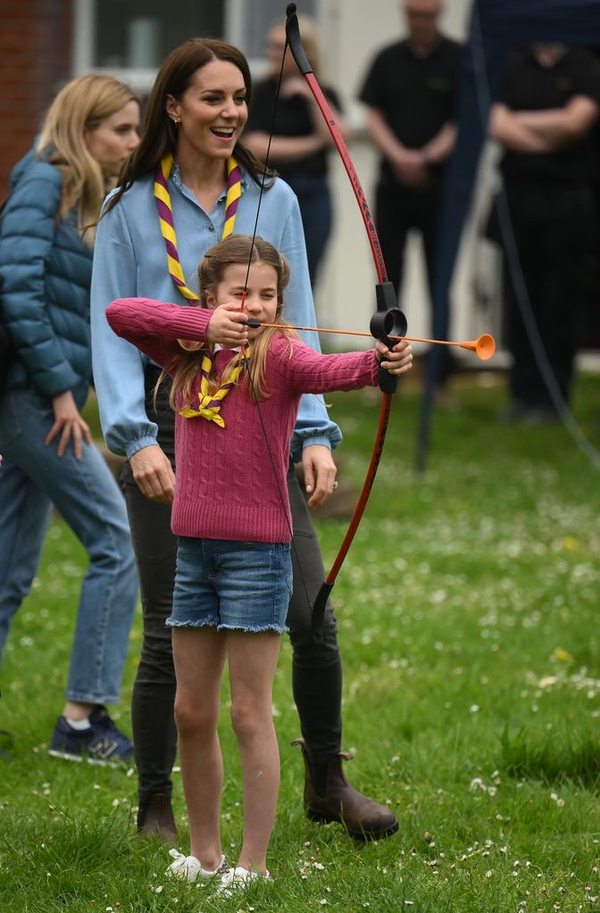 Princess Charlotte of Wales tries her hand at archery 