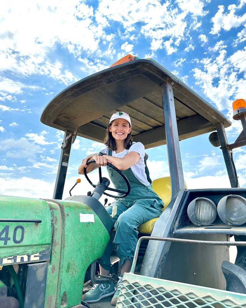 Jennifer Garner sitting in a tractor