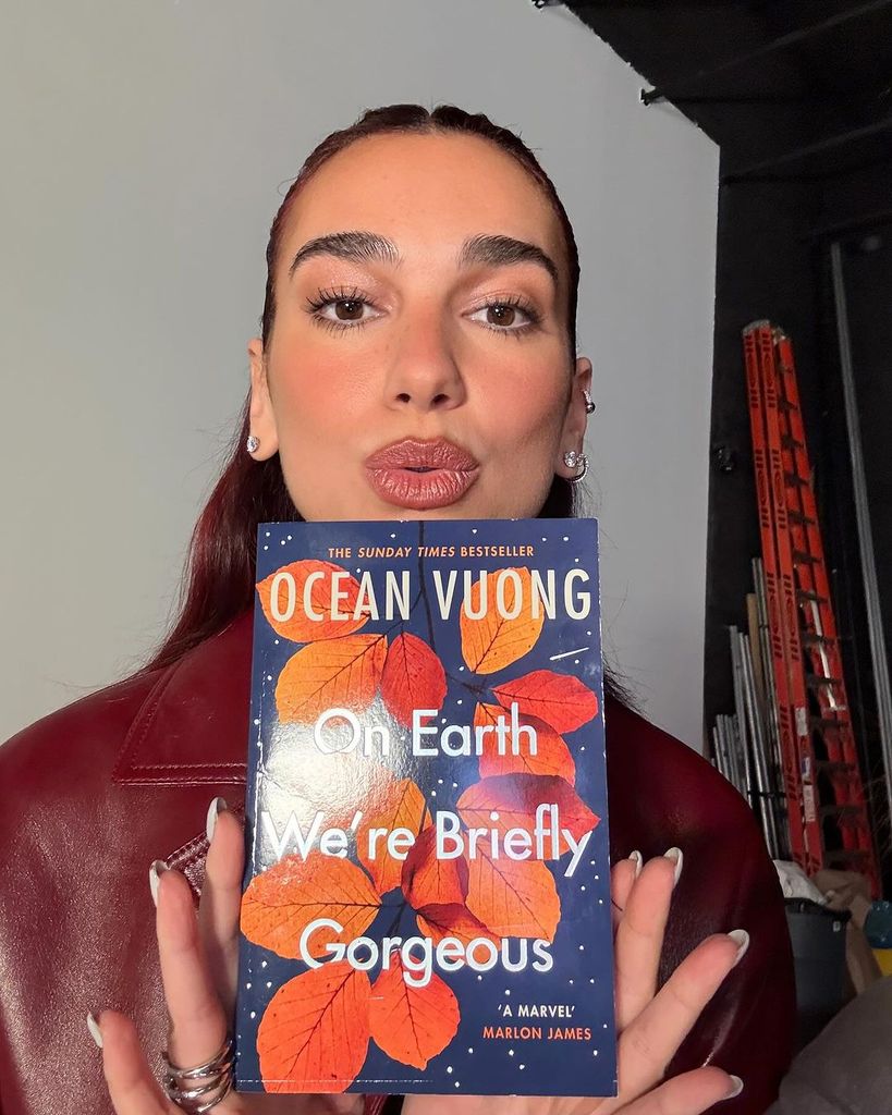 Dua shared our two favourite things this season: a great book and burgundy clothing