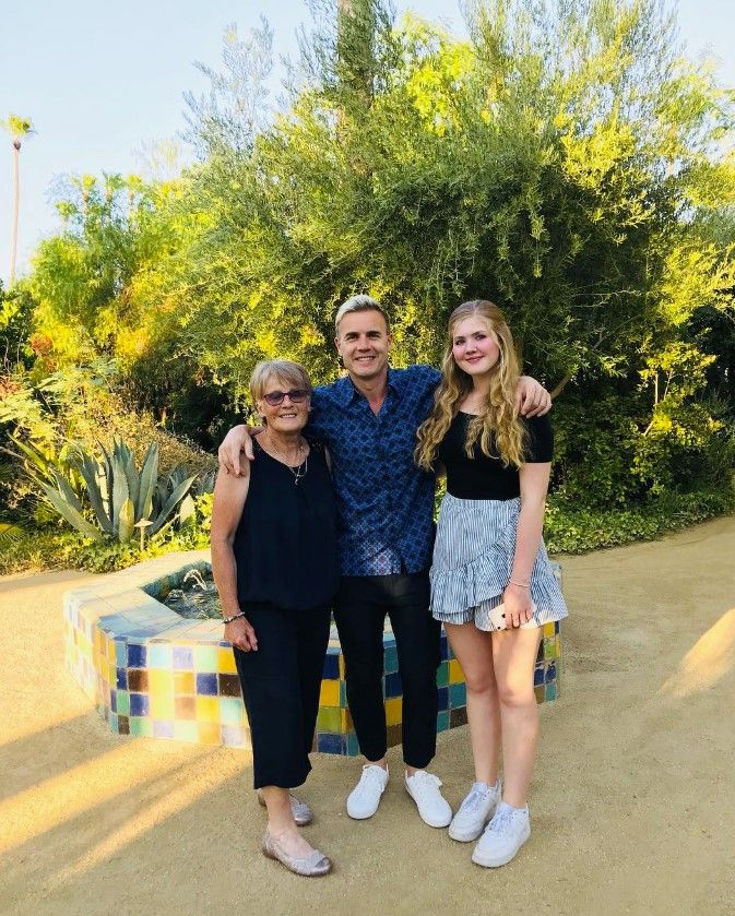 Gary Barlow with his daughter Emily (right)