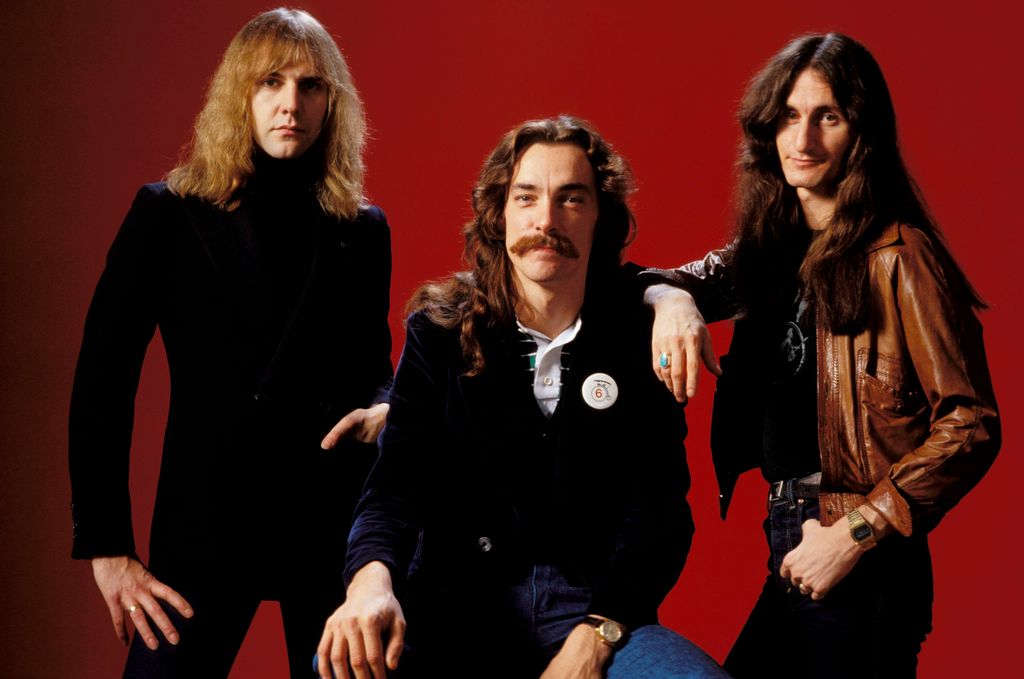 Photo of Neil PEART and RUSH and Alex LIFESON and Geddy LEE; L-R: Alex Lifeson, Neil Peart, Geddy Lee - posed, studio, group shot