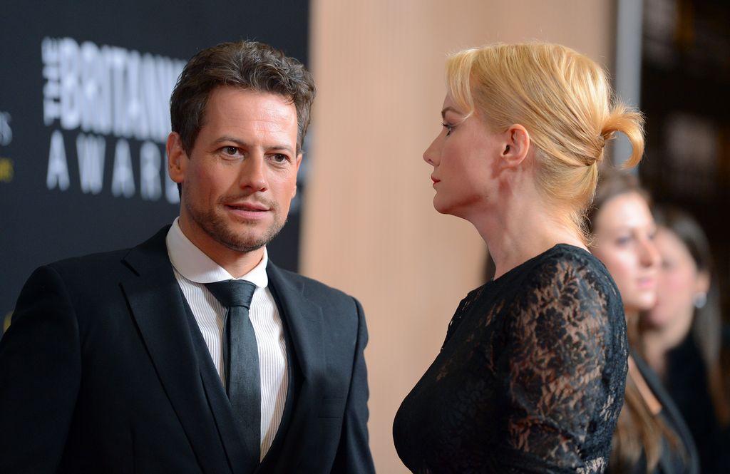 Alice Evans looking at Ioan Gruffudd with a stern look
