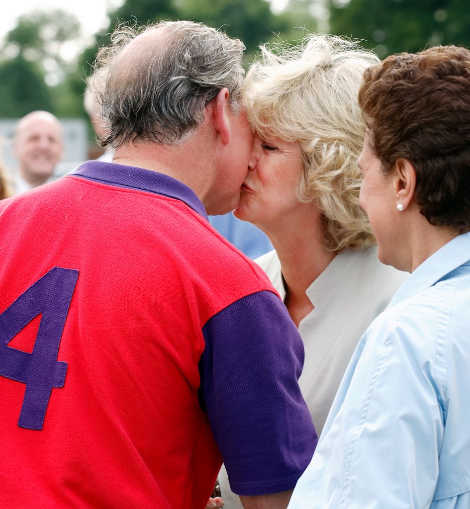 Charles and Camilla kiss at the polo