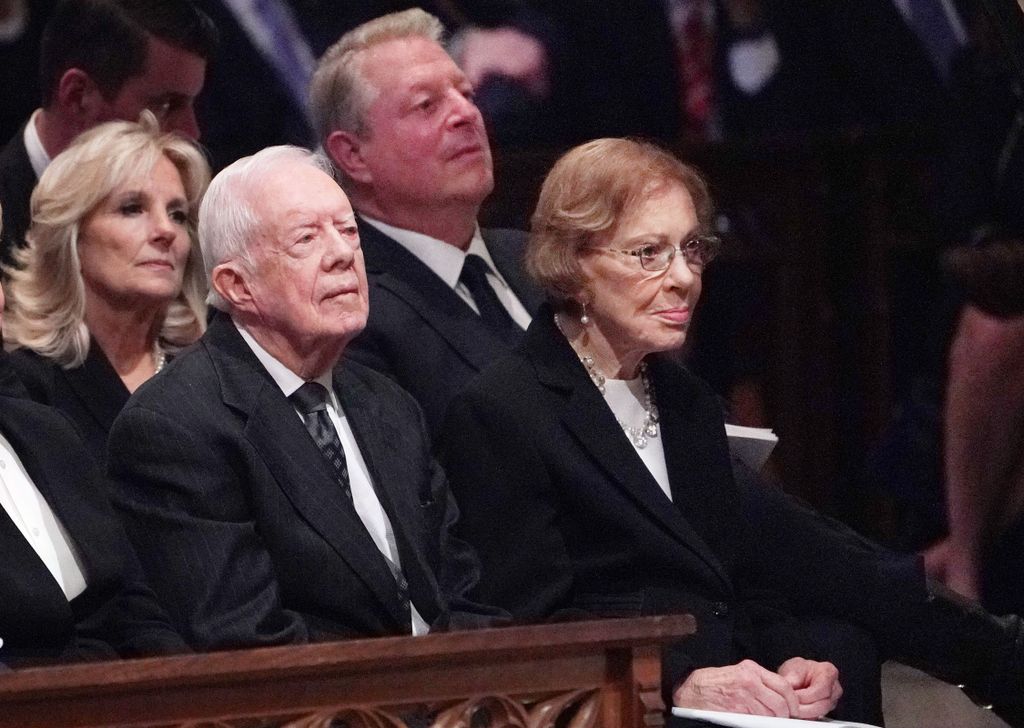 Former US president Jimmy Carter and his wife Rosalynn attend a funeral service for former US president George H. W. Bush at the National Cathedral in Washington, DC on December 5, 2018