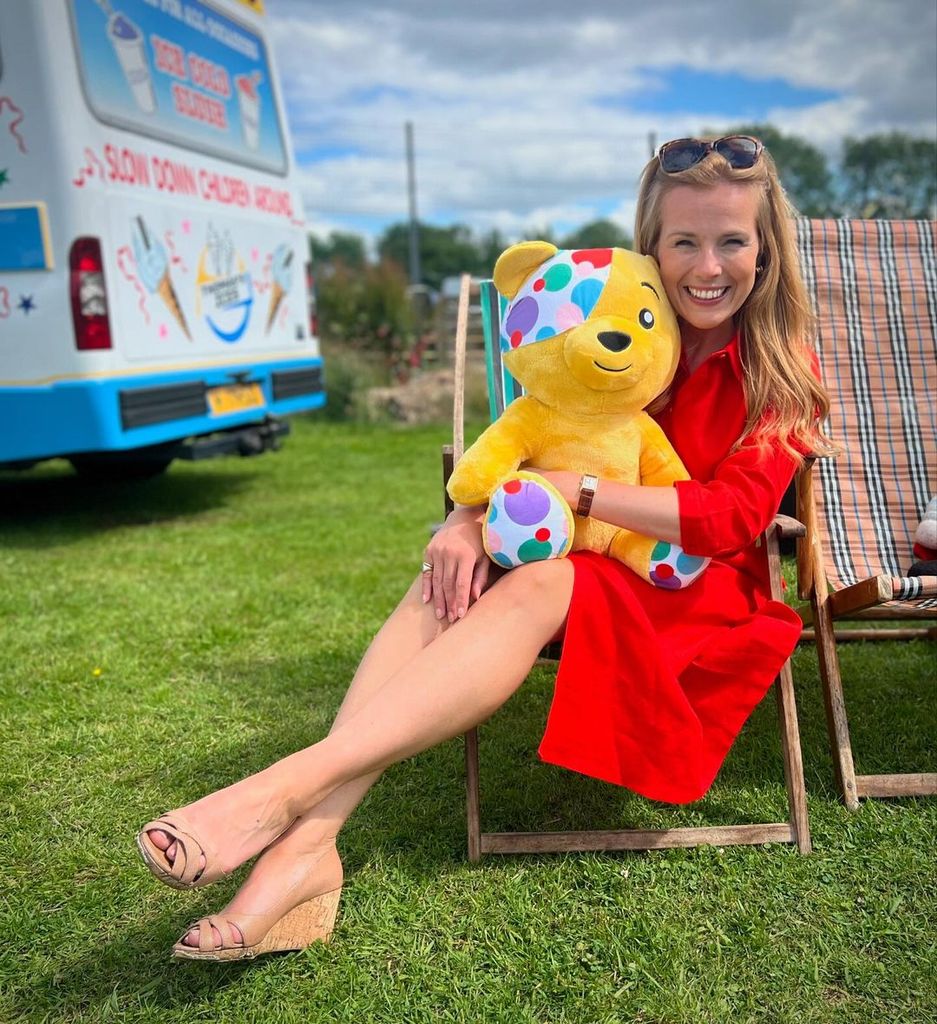 Christina Trevanion and Pudsey Bear behind the scenes of Bargain Hunt