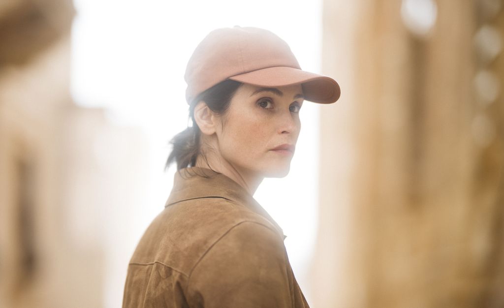 woman wearing pink cap and pony tail