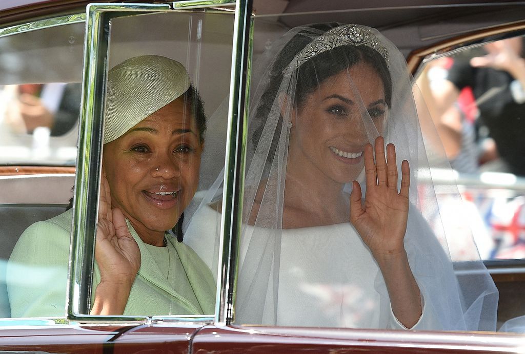 TOPSHOT - Meghan Markle (R) and her mother, Doria Ragland, arrive for her wedding ceremony to marry Britain's Prince Harry, Duke of Sussex, at St George's Chapel, Windsor Castle, in Windsor, on May 19, 2018. (Photo by Oli SCARFF / AFP) (Photo by OLI SCARFF/AFP via Getty Images)