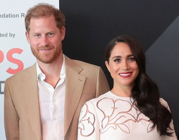 meghan markle white dress red lipstick with prince harry