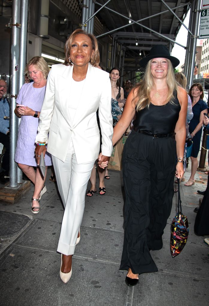 Robin Roberts and Amber Laign are seen arriving at the Broadway show "Call Me Izzy" on June 12, 2025 in New York City