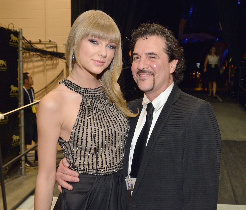 Taylor Swift and  founder, Big Machine Records Scott Borchetta attend the 48th Annual Academy of Country Music Awards at the MGM Grand Garden Arena on April 7, 2013 in Las Vegas, Nevada