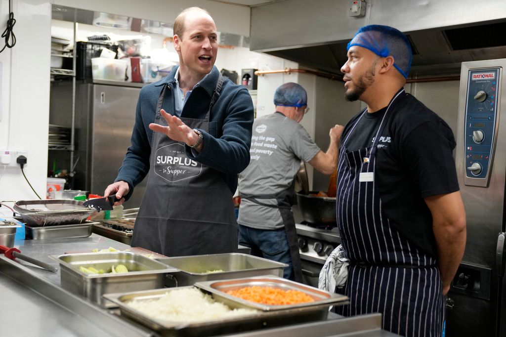 Prince William helps make bolognese sauce with head chef Mario Confait
