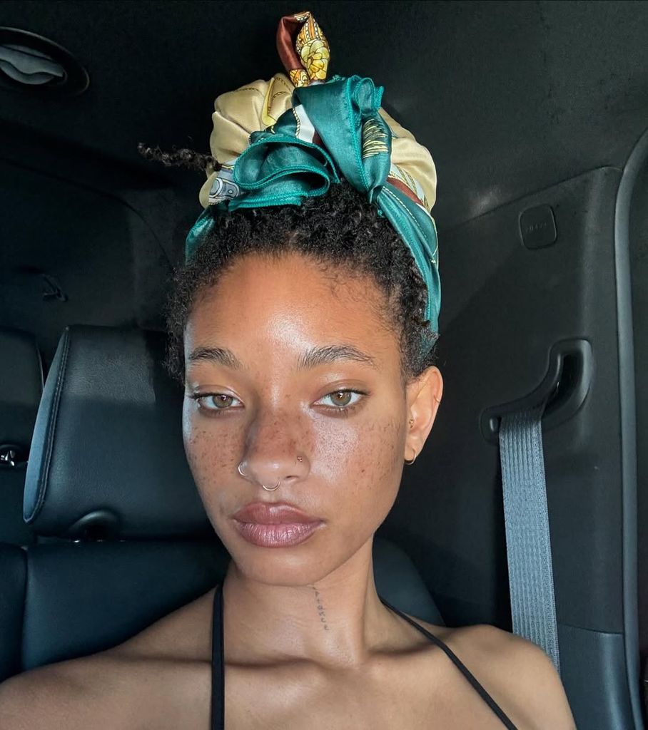 Willow Smith sitting in the car 