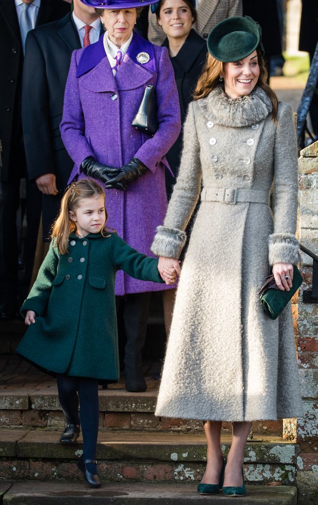 Catherine, and Princess Charlotte by church steps in coat dresses