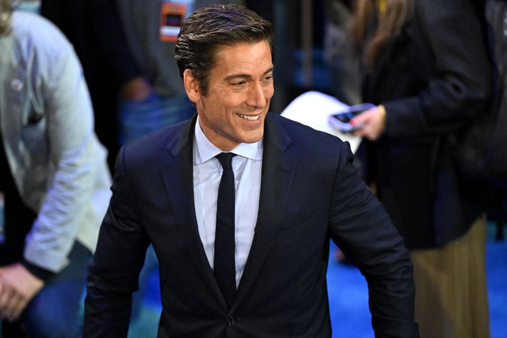 US broadcaster David Muir smiles at the end of a presidential debate with US Vice President and Democratic presidential candidate Kamala Harris and former US President and Republican presidential candidate Donald Trump at the National Constitution Center in Philadelphia, Pennsylvania, on September 10, 2024.