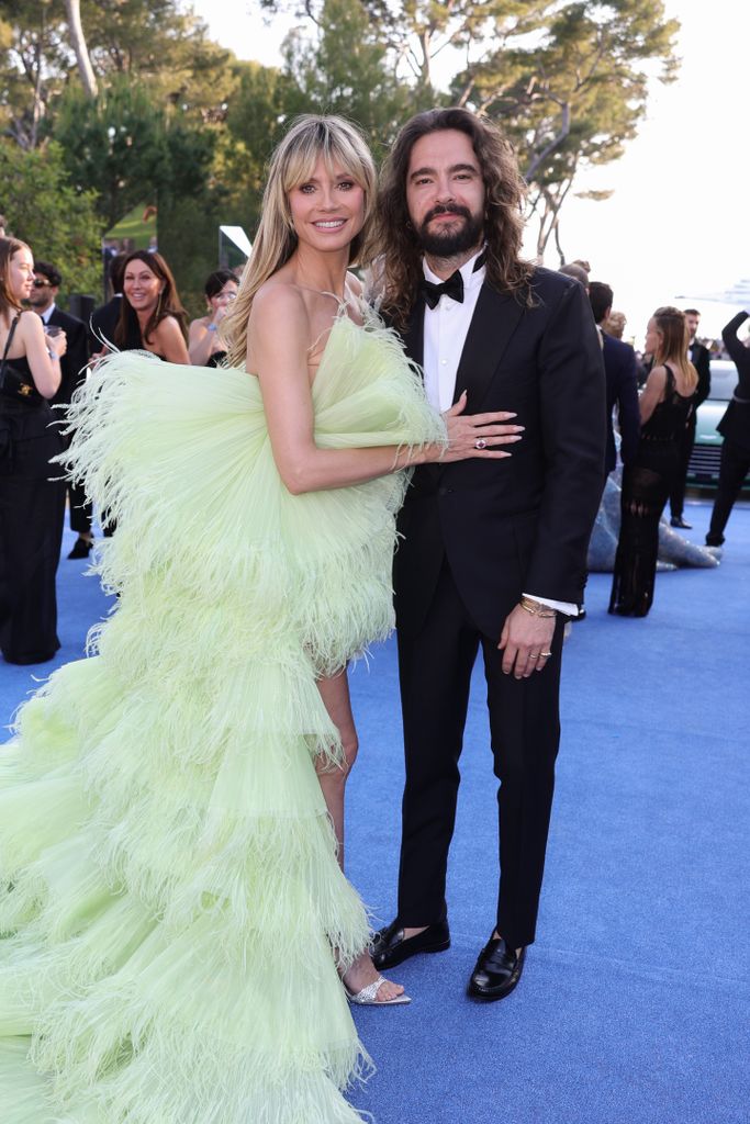 Heidi Klum and Tom Kaulitz attend the amfAR Cannes Gala 