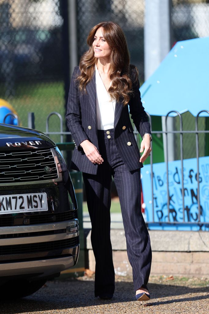 Kate Middleton switches up her suit style with a sweater vest