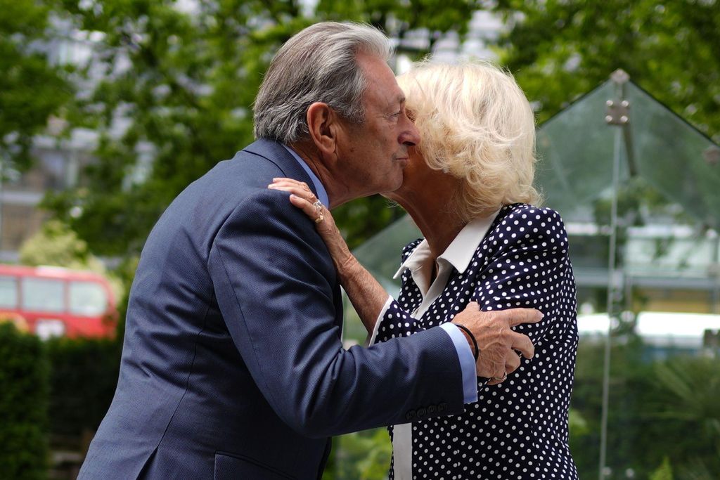  Queen Camilla is greeted by Alan Titchmarsh