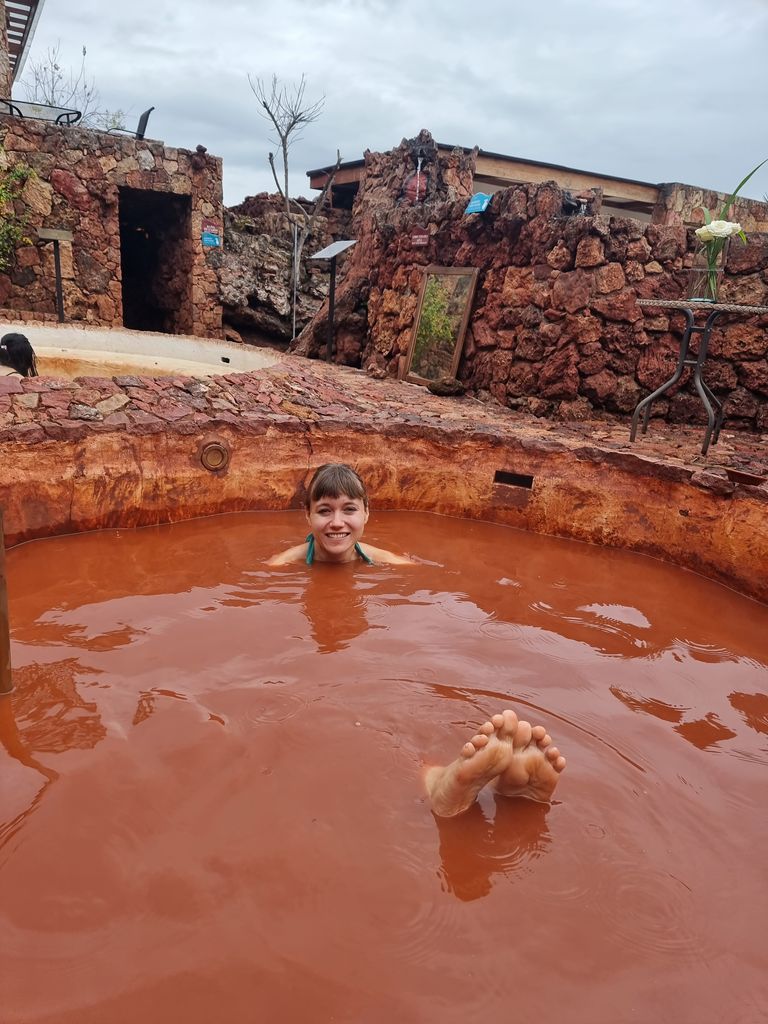 Woman in a mud bath in Ecuador