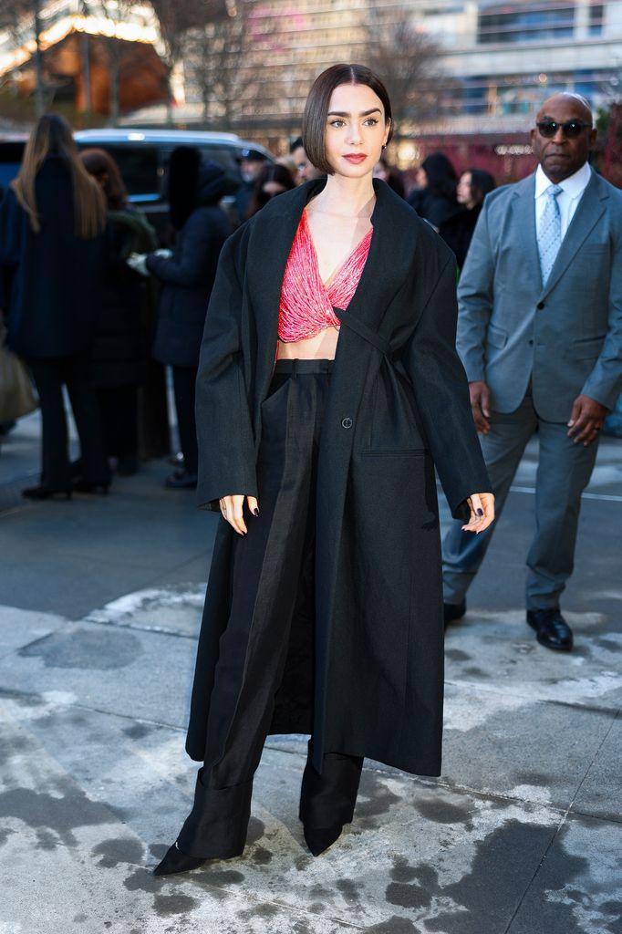 Lily attends the Calvin Klein fashion show 