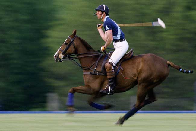 Prince Charles riding a horse