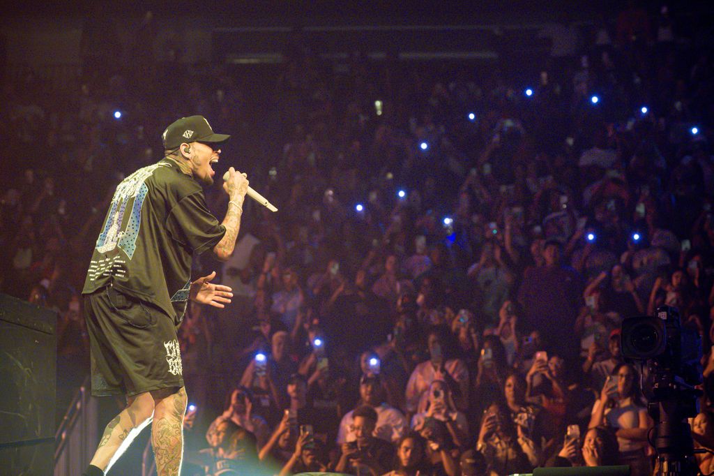 Chris Brown performs onstage during the 11:11 tour at Toyota Center on July 16, 2024 in Houston, Texas. 